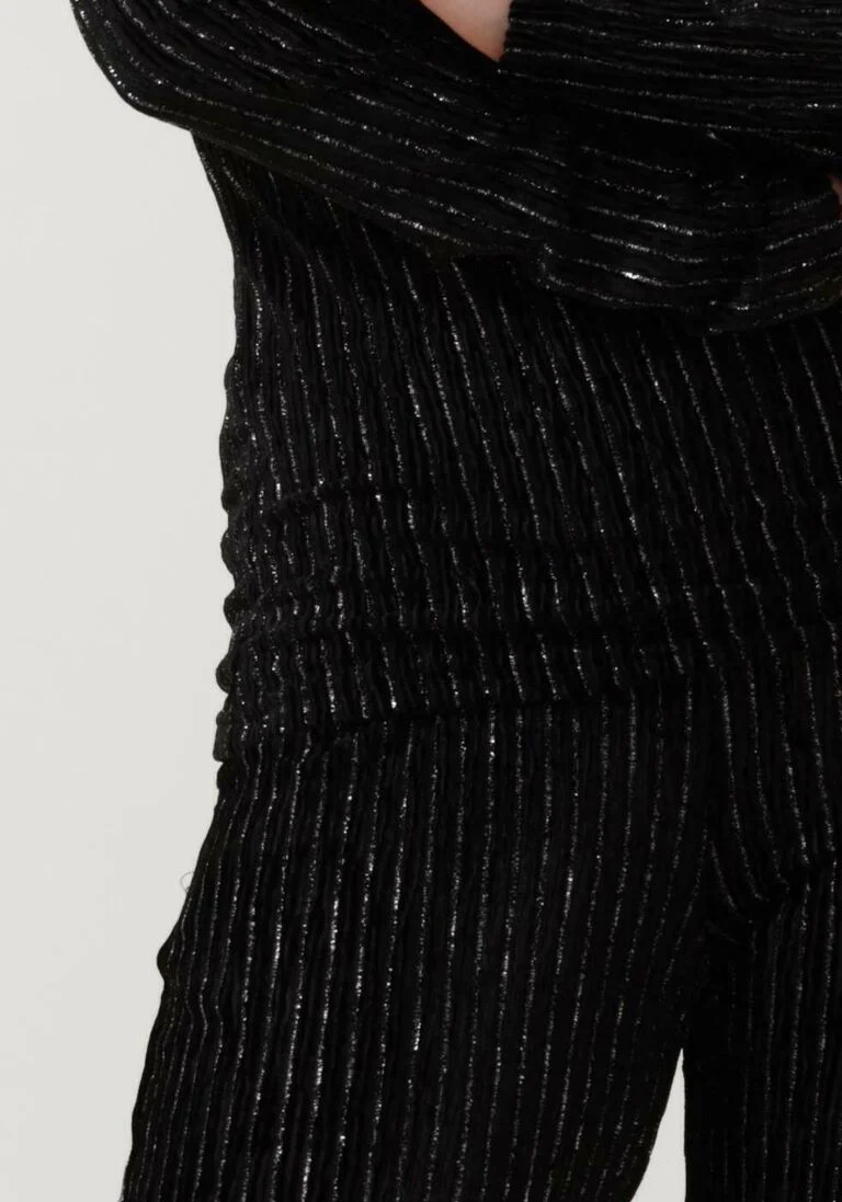 ANOTHER LABEL zwarte another label flared broek rivoli velvet pants