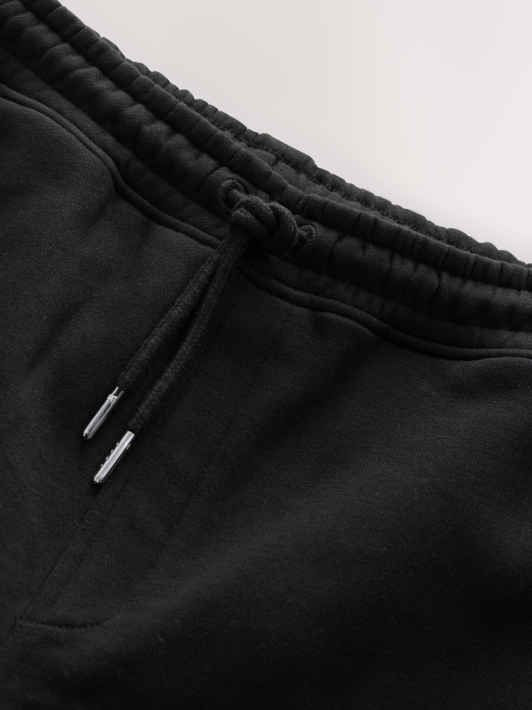 Zwart - Geborstelde jersey shorts met ritszakken