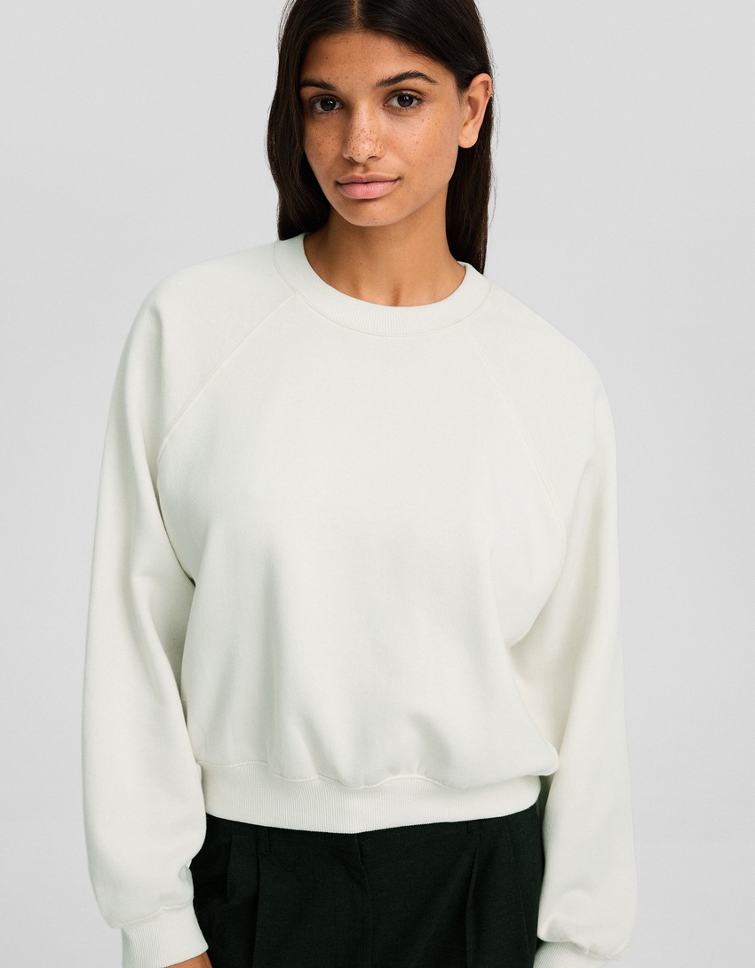 Moletom com mangas raglan