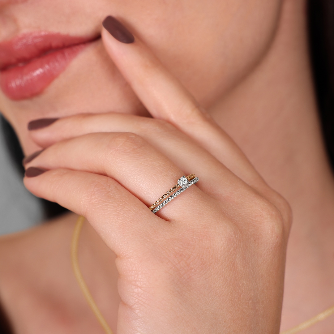 Ring 750/18 K Rosé-/ Weissgold mit Diamanten 0.06 ct H/si