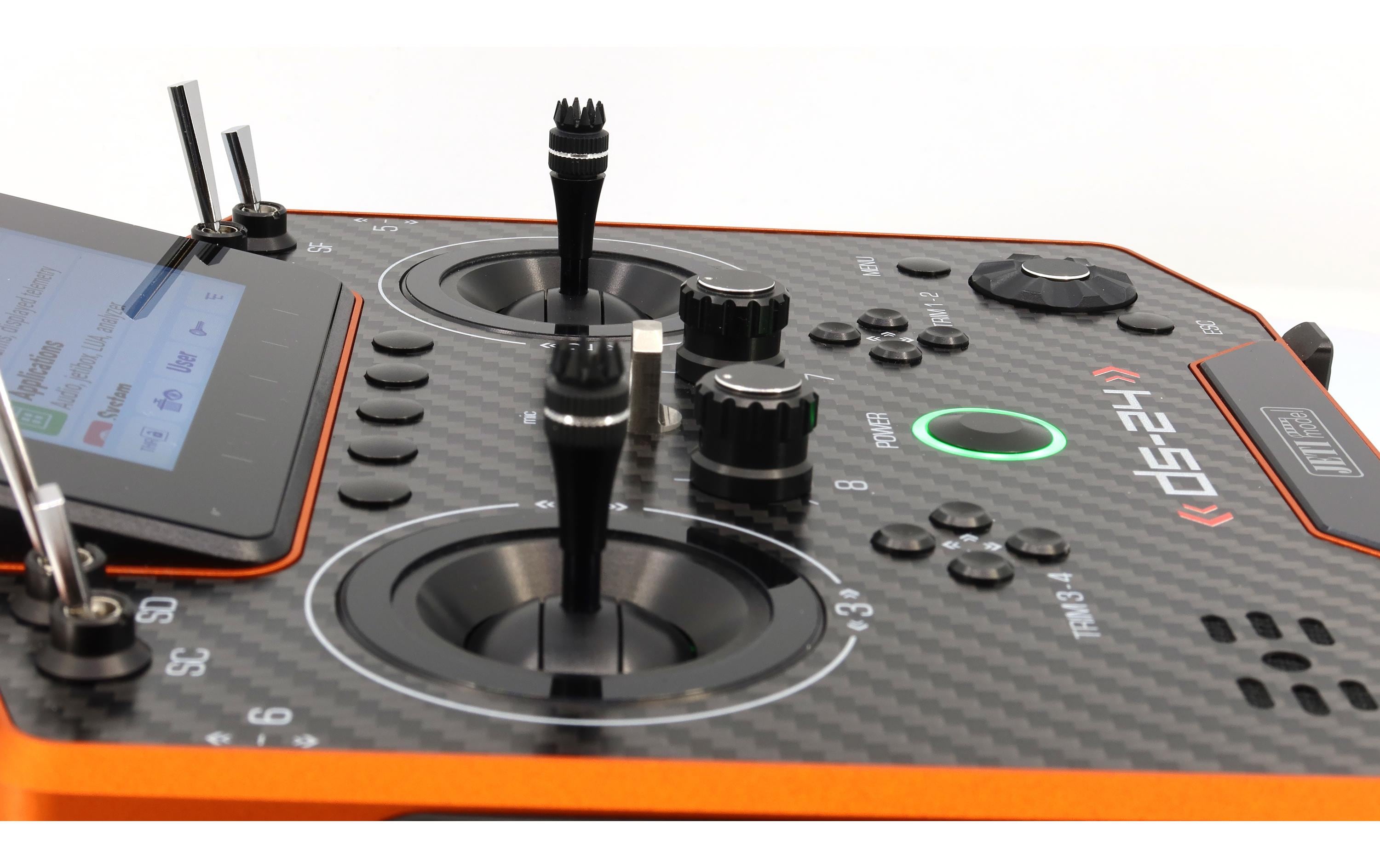 Fernsteuerung DS-24II Carbon Line Orange 24 Kanal, Duplex EX<br>Professioneller 24-Kanal-Sender mit Geber auf Rückseite und Carbon-Frontplatte