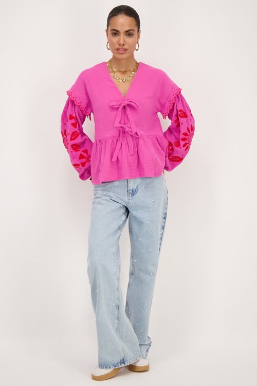 Roze mousseline blouse met embroidery en strikjes