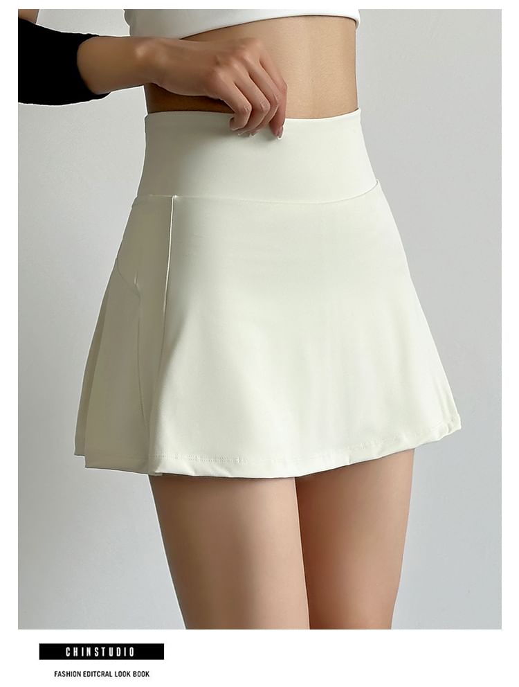 Engiko - Hoge taille effen mini A-lijn sportrok