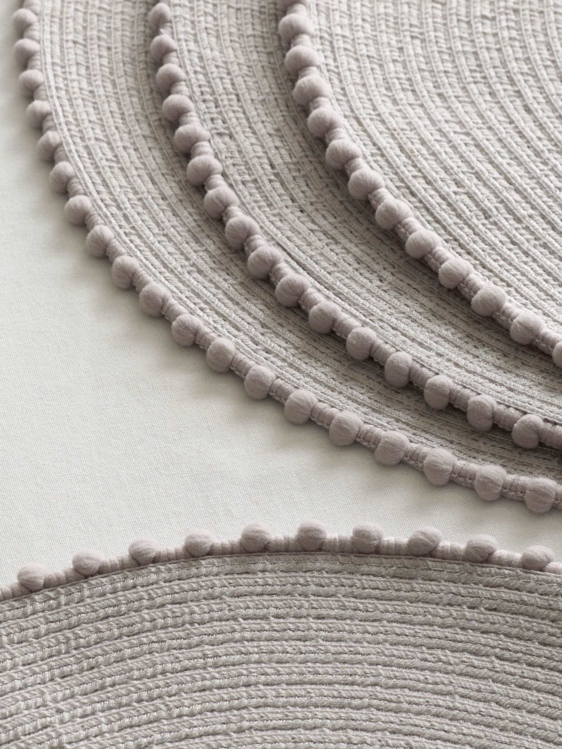 Set van 4 placemats met pompon