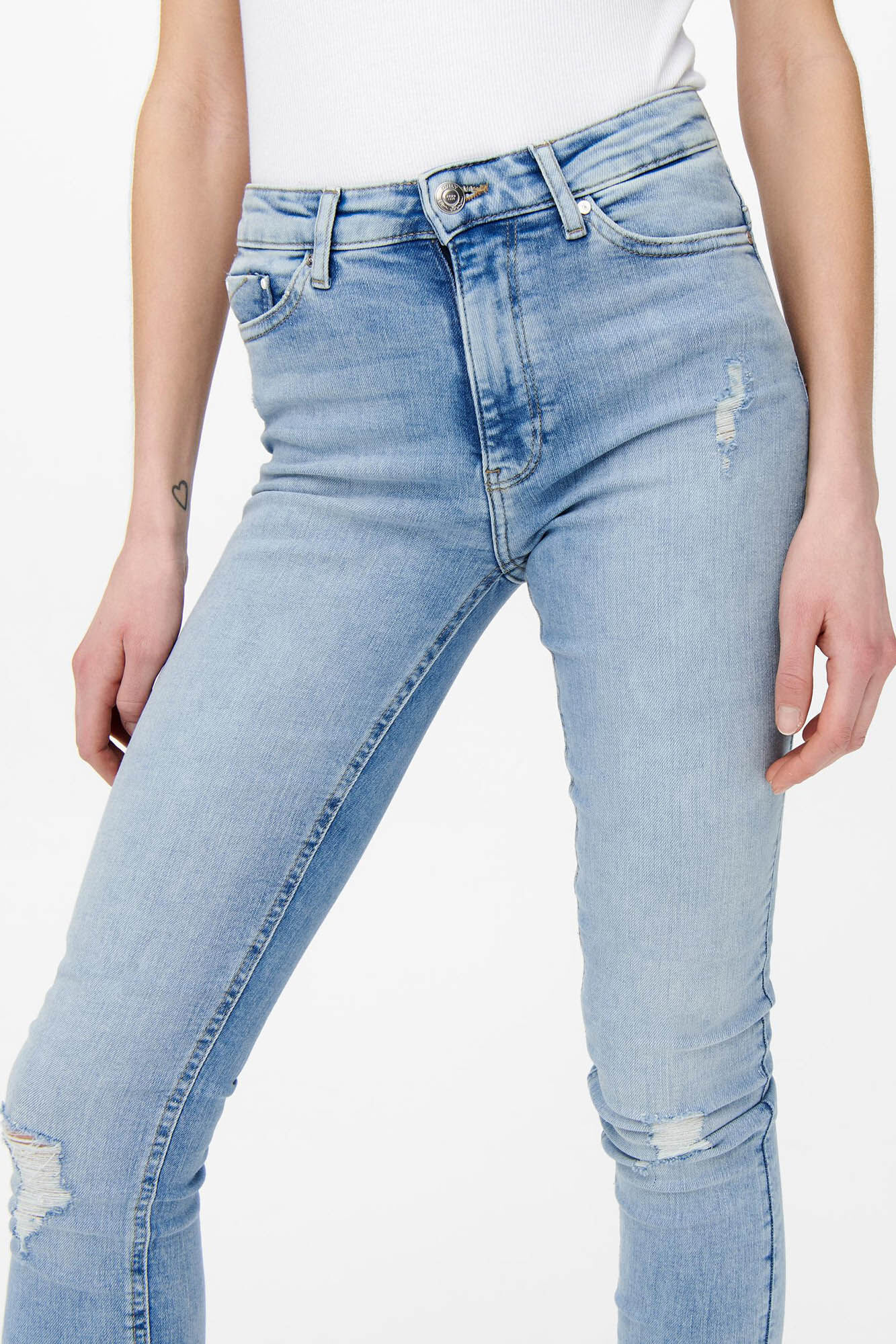 Calça jeans skinny e cintura média