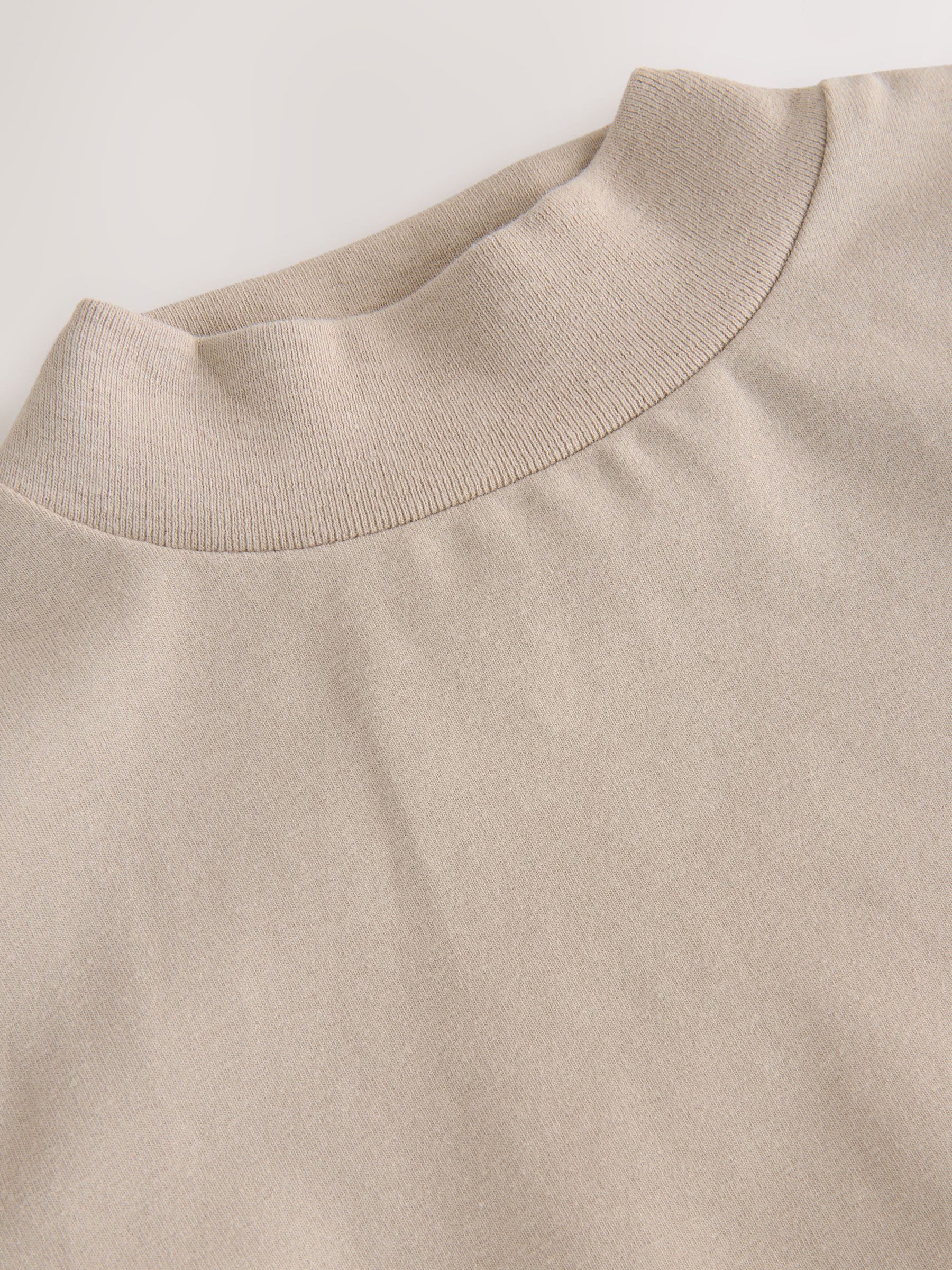 Pastelgeel - T-shirt met coltrui en lange mouwen (3 mnd - 7 jr)