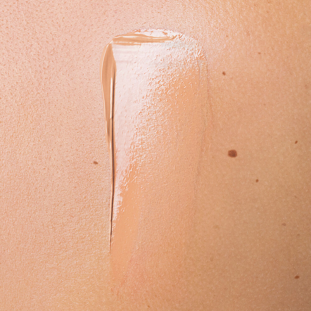 Nu Bare Look Tint  FOND DE TEINT POUR LA PEAU FLEXIBLE ET MODULABLE. ENRICHIE EN ACIDE HYALURONIQUE. - Nu_10