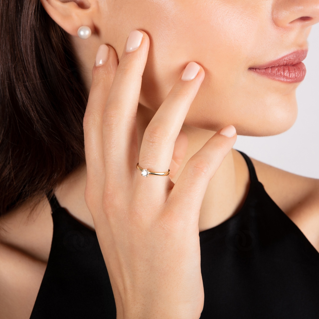 Verlobungsring 750/18 K Gelbgold mit Diamant 0.25 ct H/si