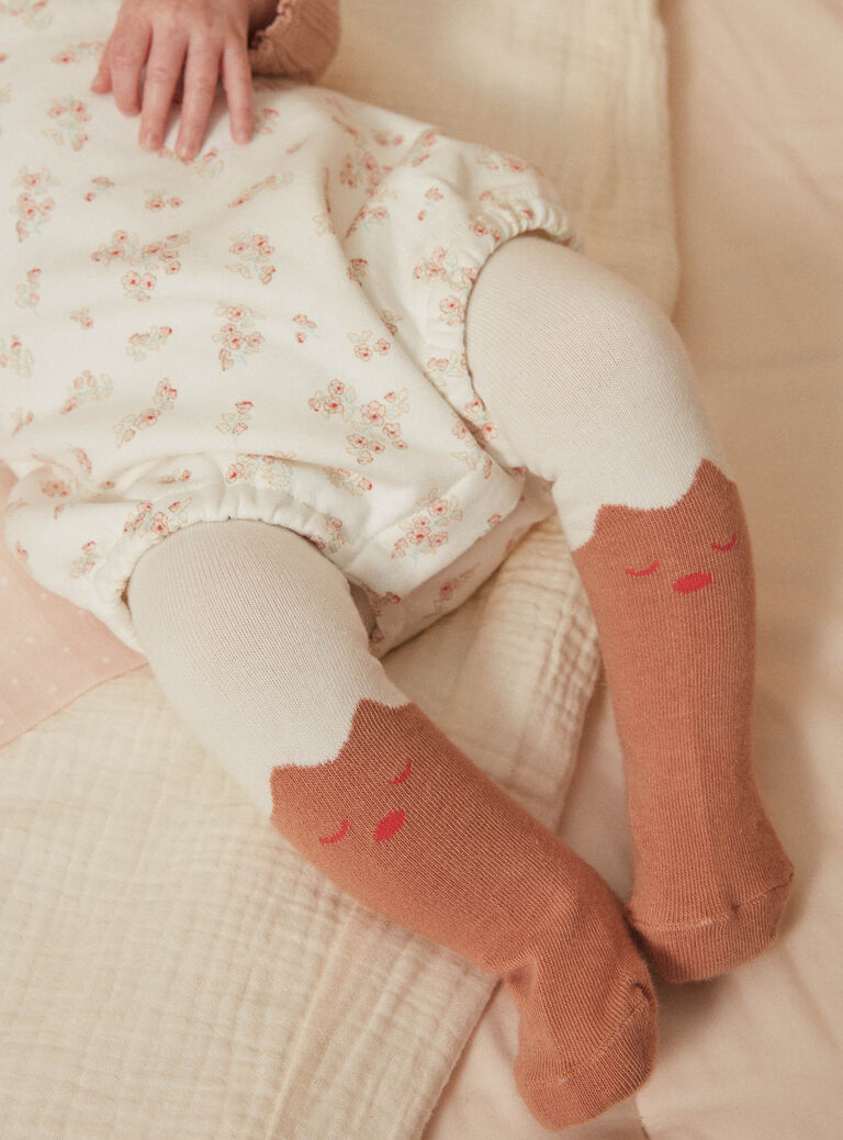 Body rose ancien, barboteuse écrue et collant