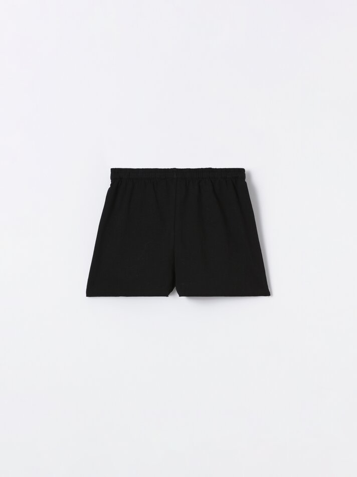 Conjunto de top e shorts com estampa - Preto