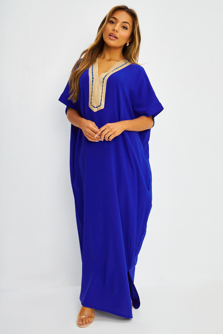 Abaya bleue à broderies dorées