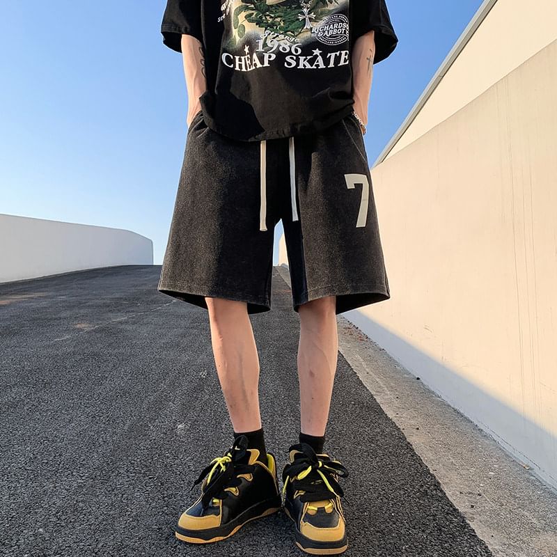 Kimeya - Gewassen sweatshorts met trekkoord en nummerprint