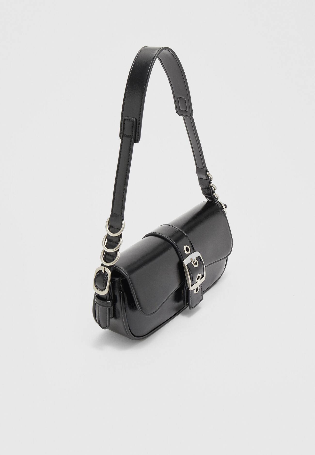 Bolsa de ombro com fivelas