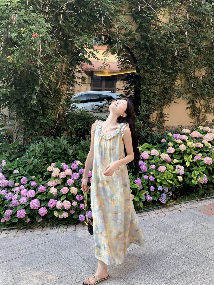 Trendycas - Mouwloze V-hals maxi-A-lijn jurk met bloemenprint