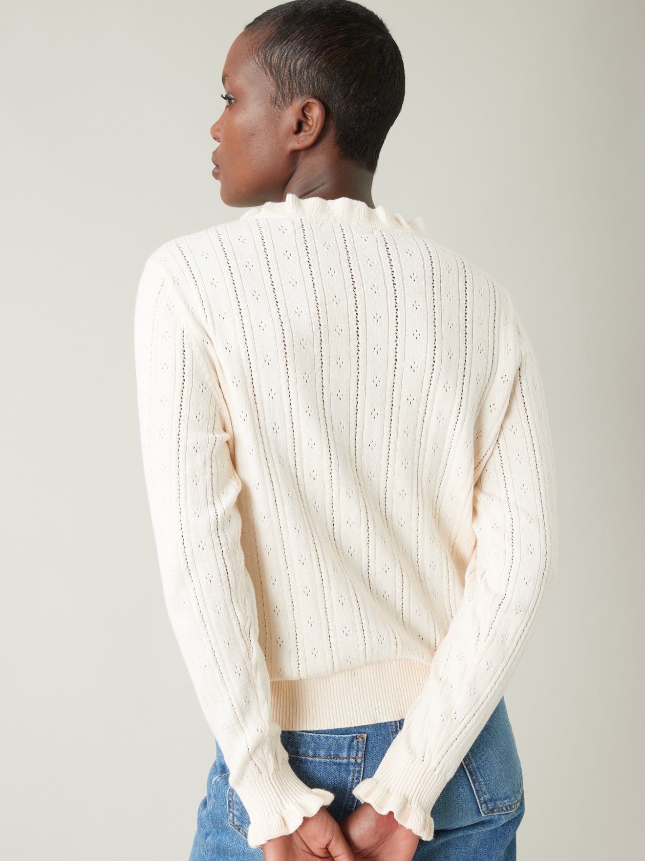 Pull maille fantaisie col volanté femme