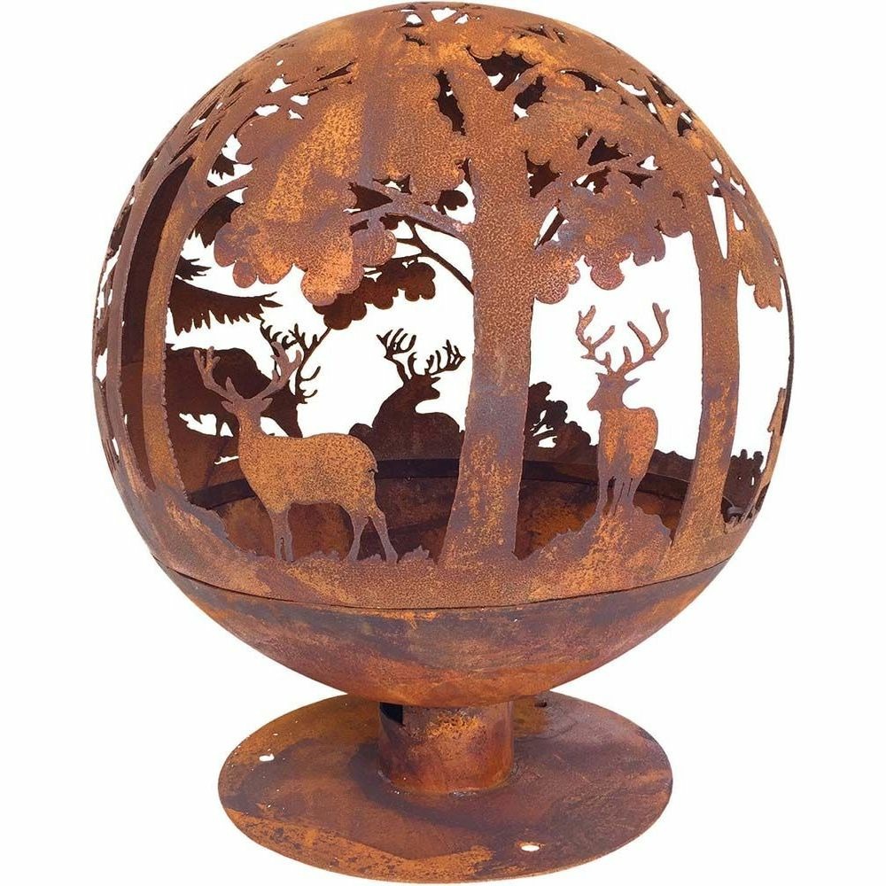 Brasero rond en métal rouillé forêt