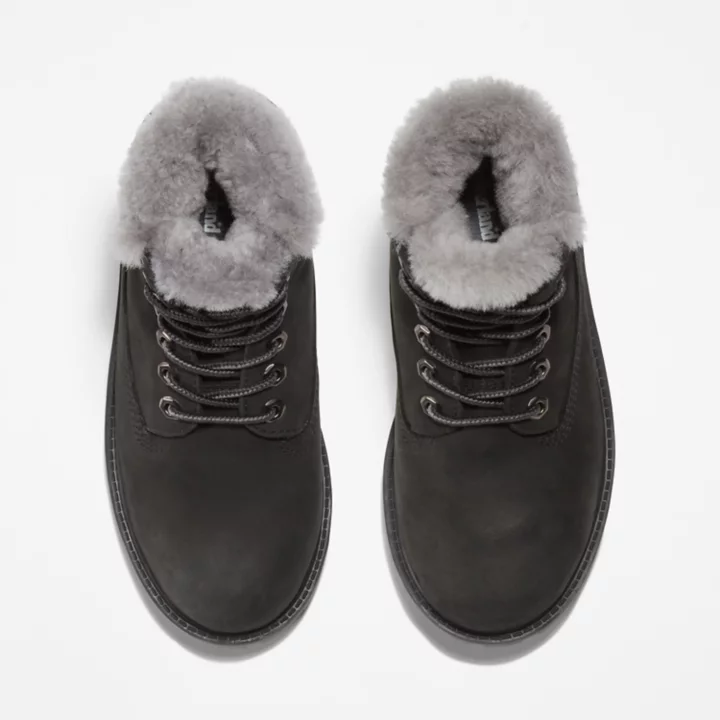 Bota de inverno Timberland Premium de 6 polegadas para jovens, na cor preta.