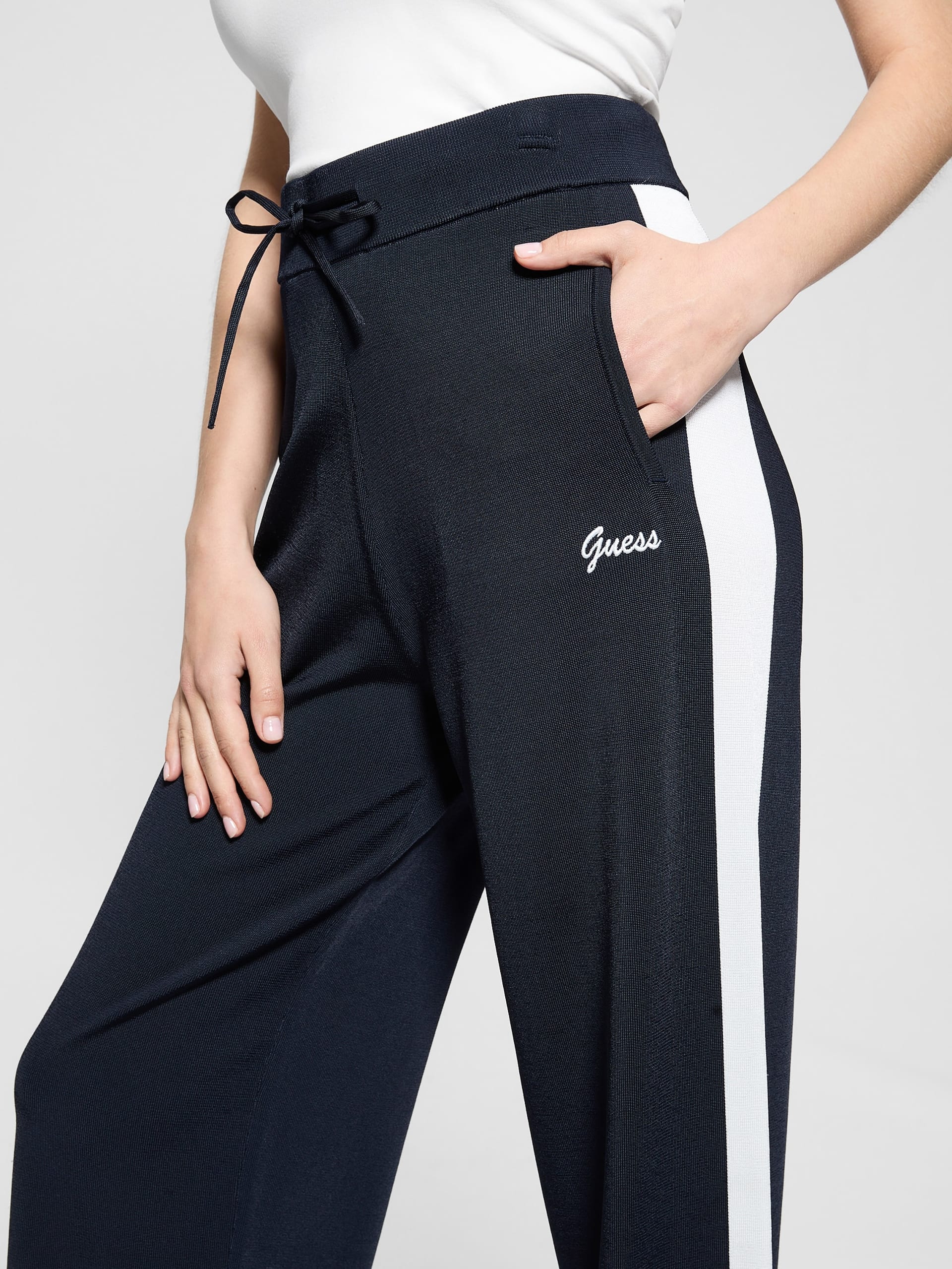 Calça de malha listrada