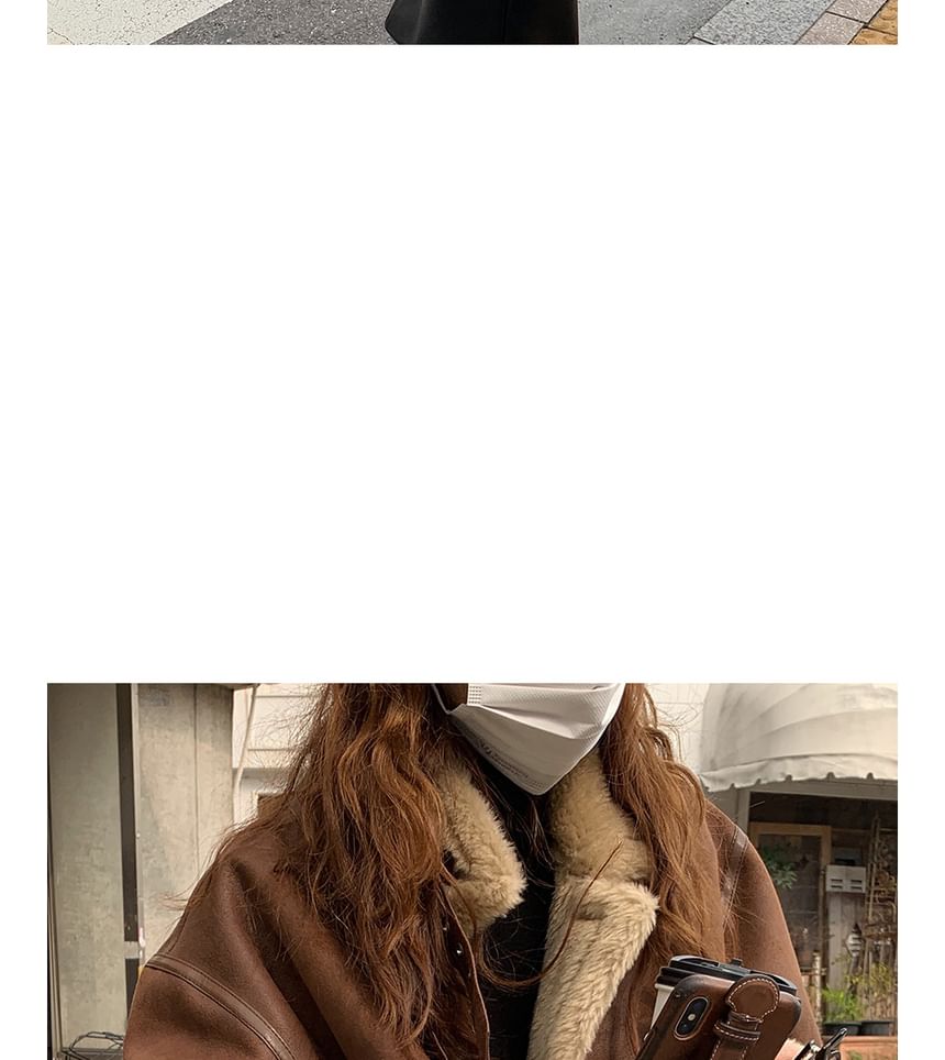 Coris - Kraagjas met effen, pluizige bies en rits