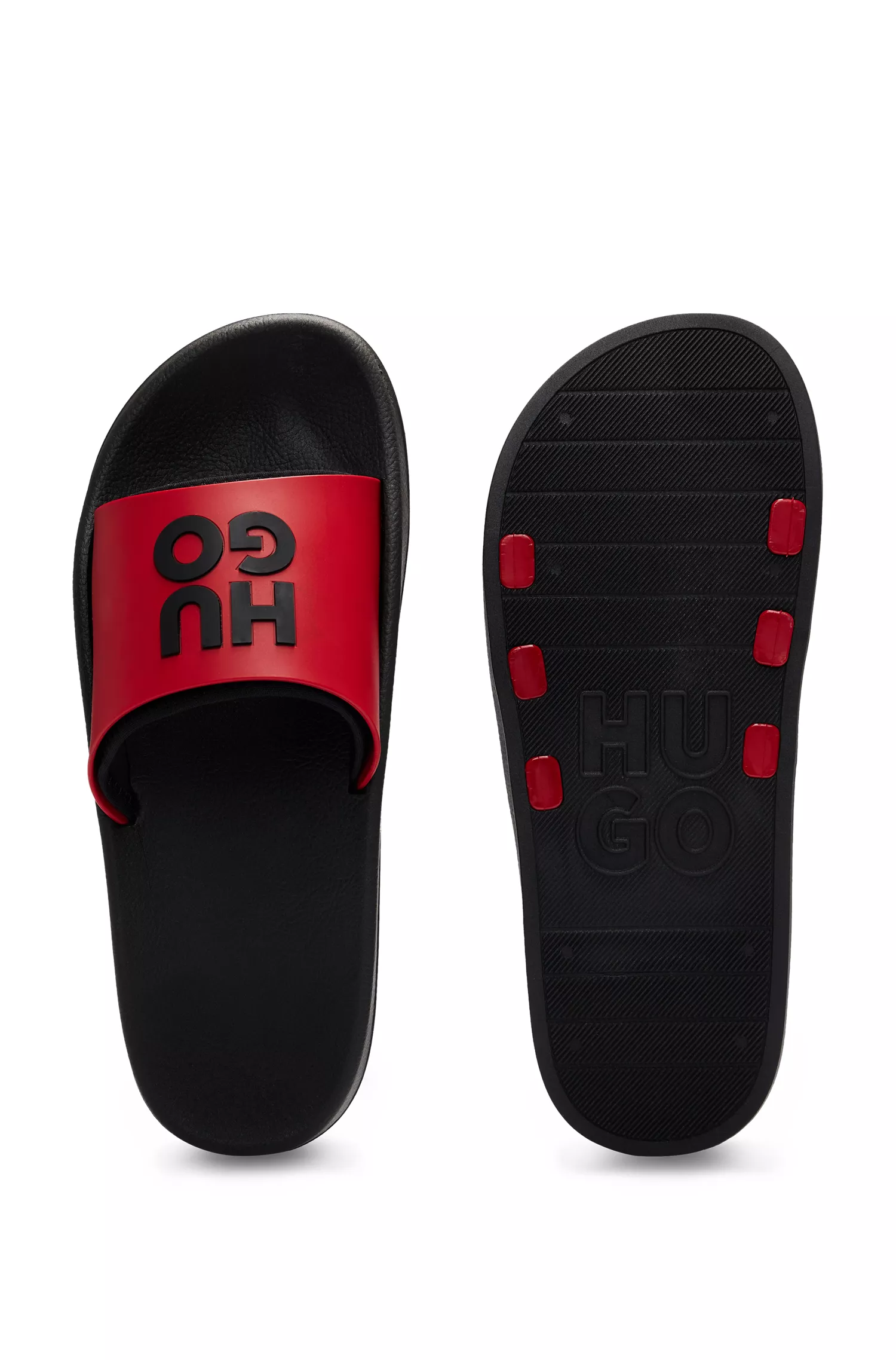Chinelo vermelho HUGO com tiras personalizadas com o logotipo.