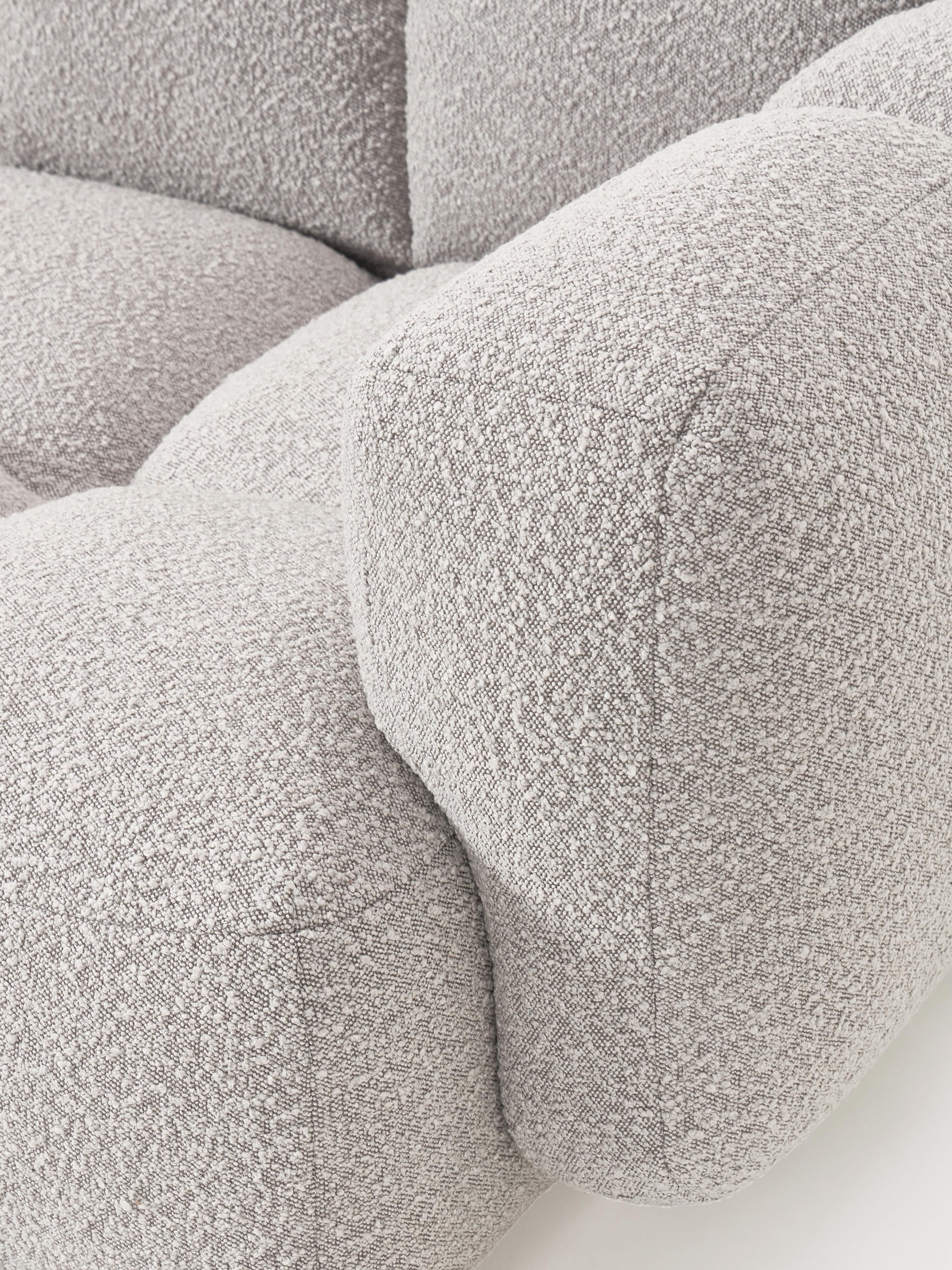 Modulaire bank Tayla (3-zits) van bouclé met poef (links/rechts)