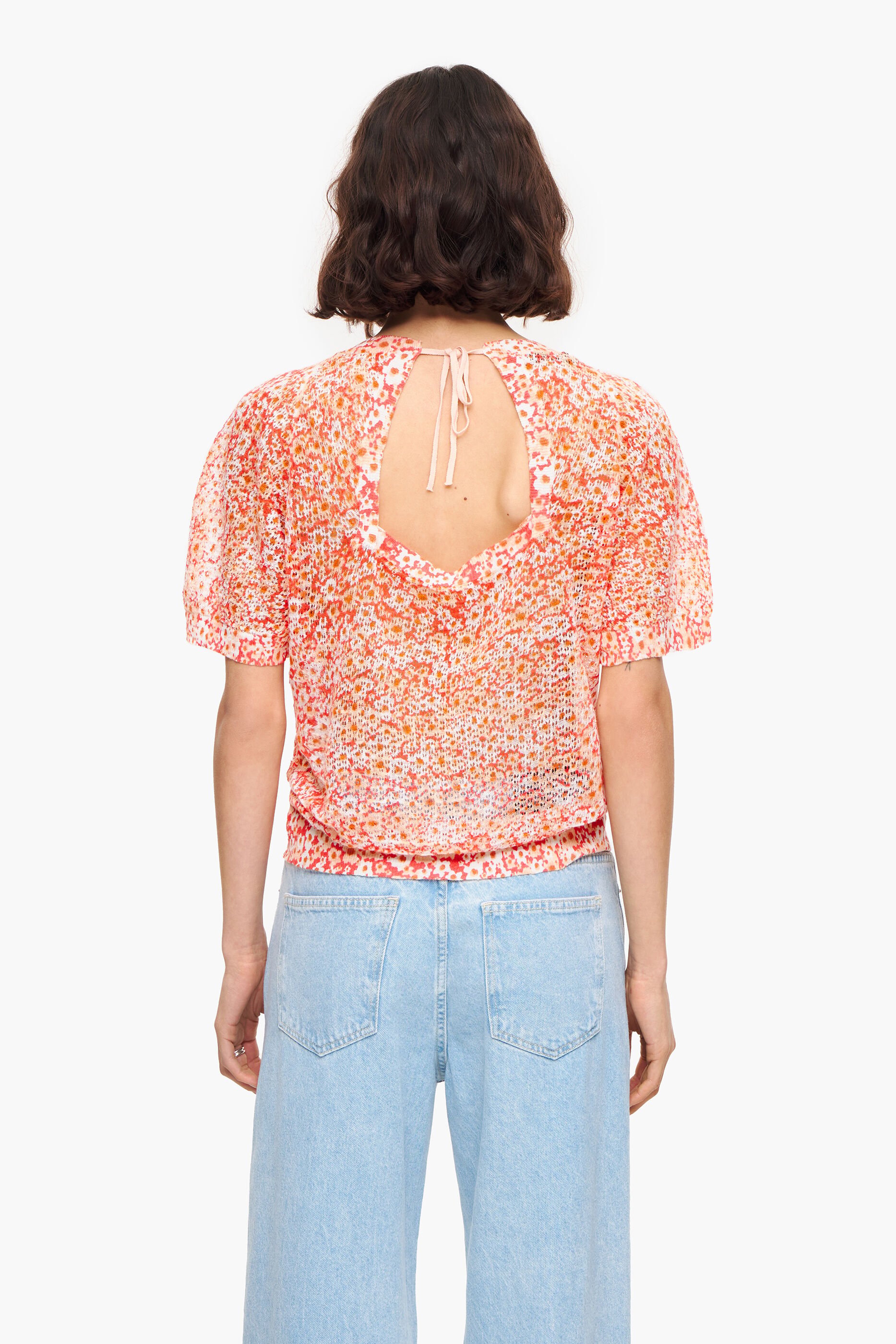 Suéter de linho cor nude com estampa floral