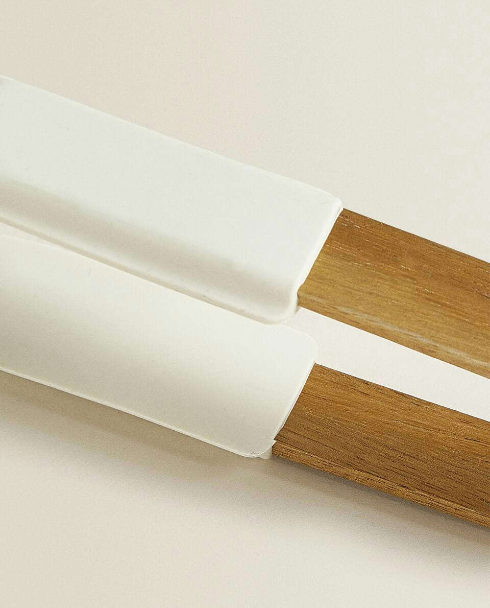 Pinças de silicone e madeira