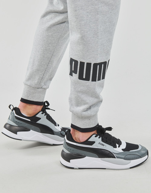 Puma - PUMA POWER SWEATPANT - Gris