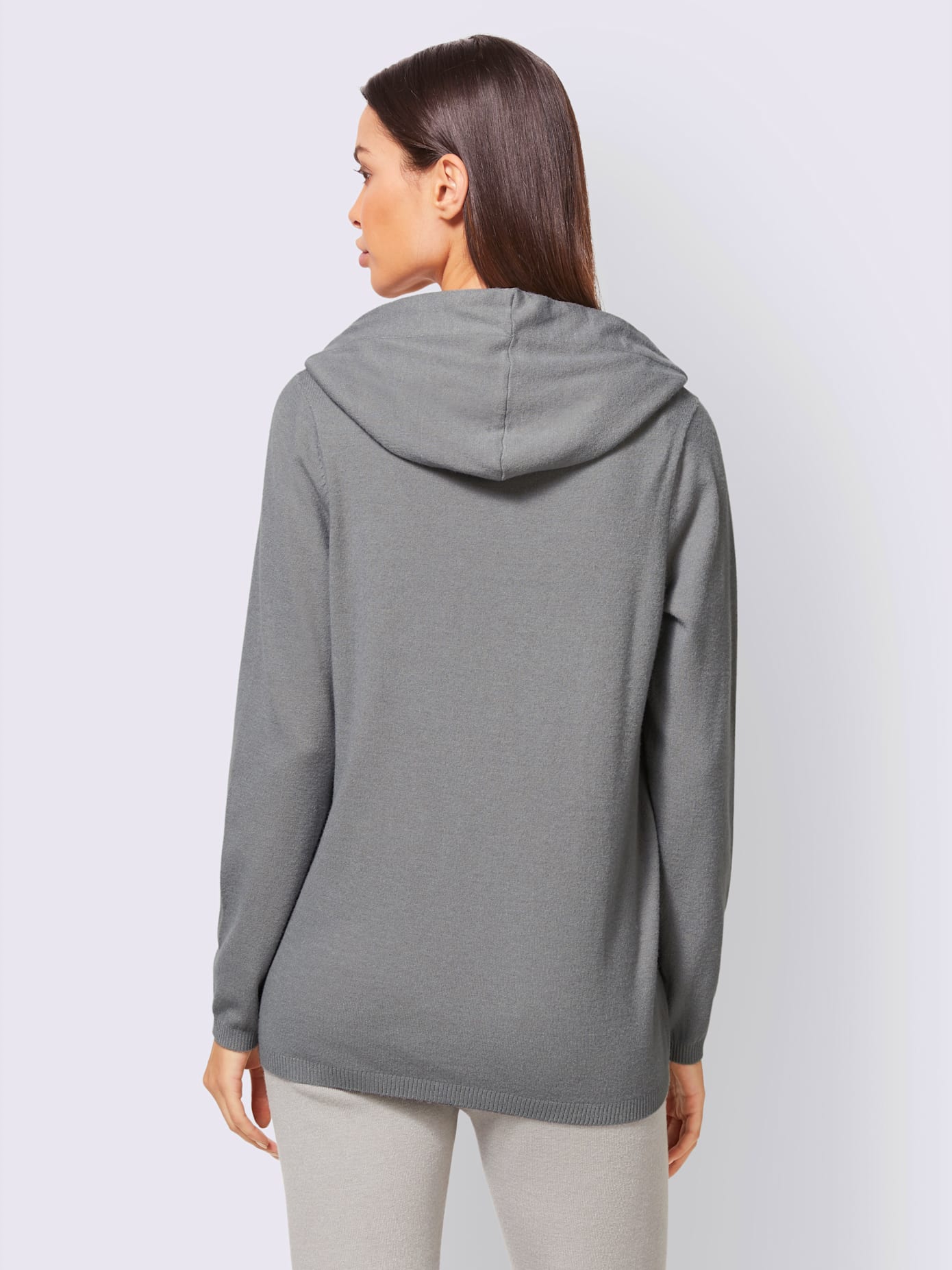 Pull capuche avec coulisse et lien à nouer