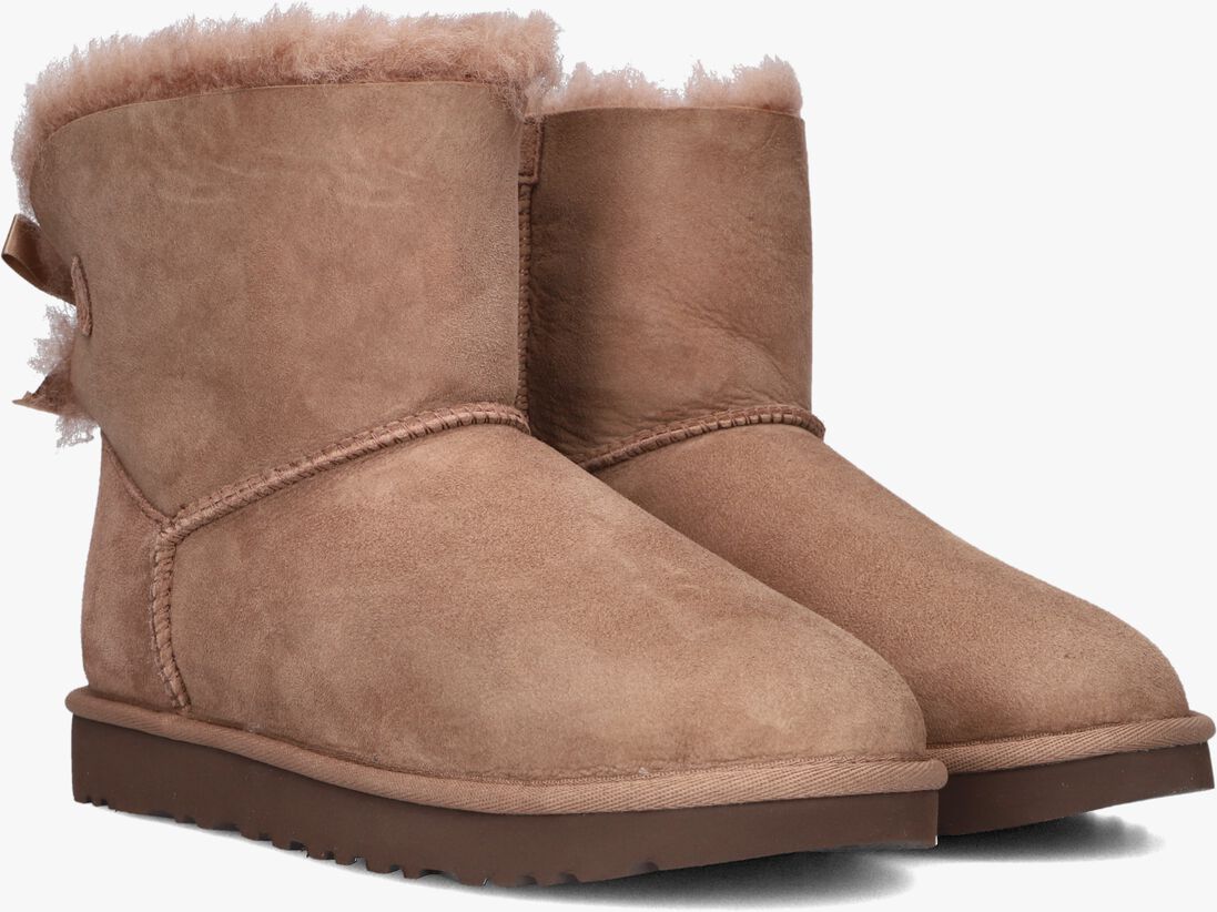 bruine ugg vachtlaarzen classic mini baily bow