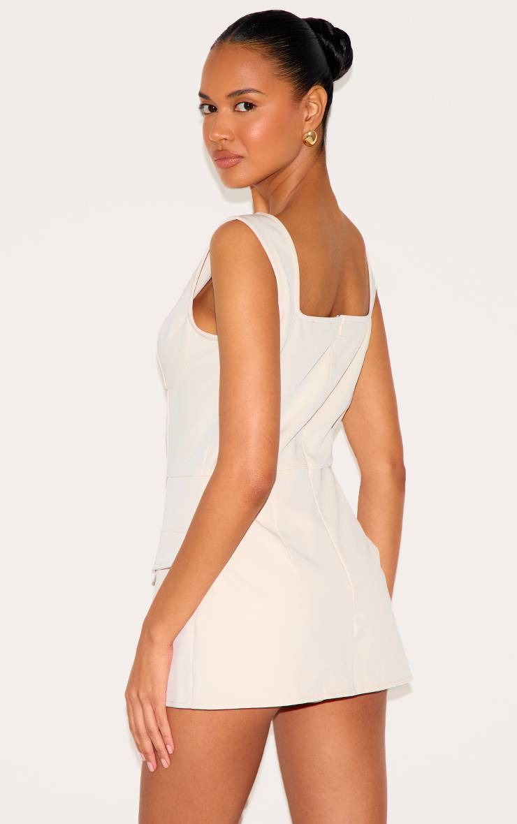 Amande Combi-short Jupe-short Sans Manches Avec Détail De Poches En Tissu Tissé
