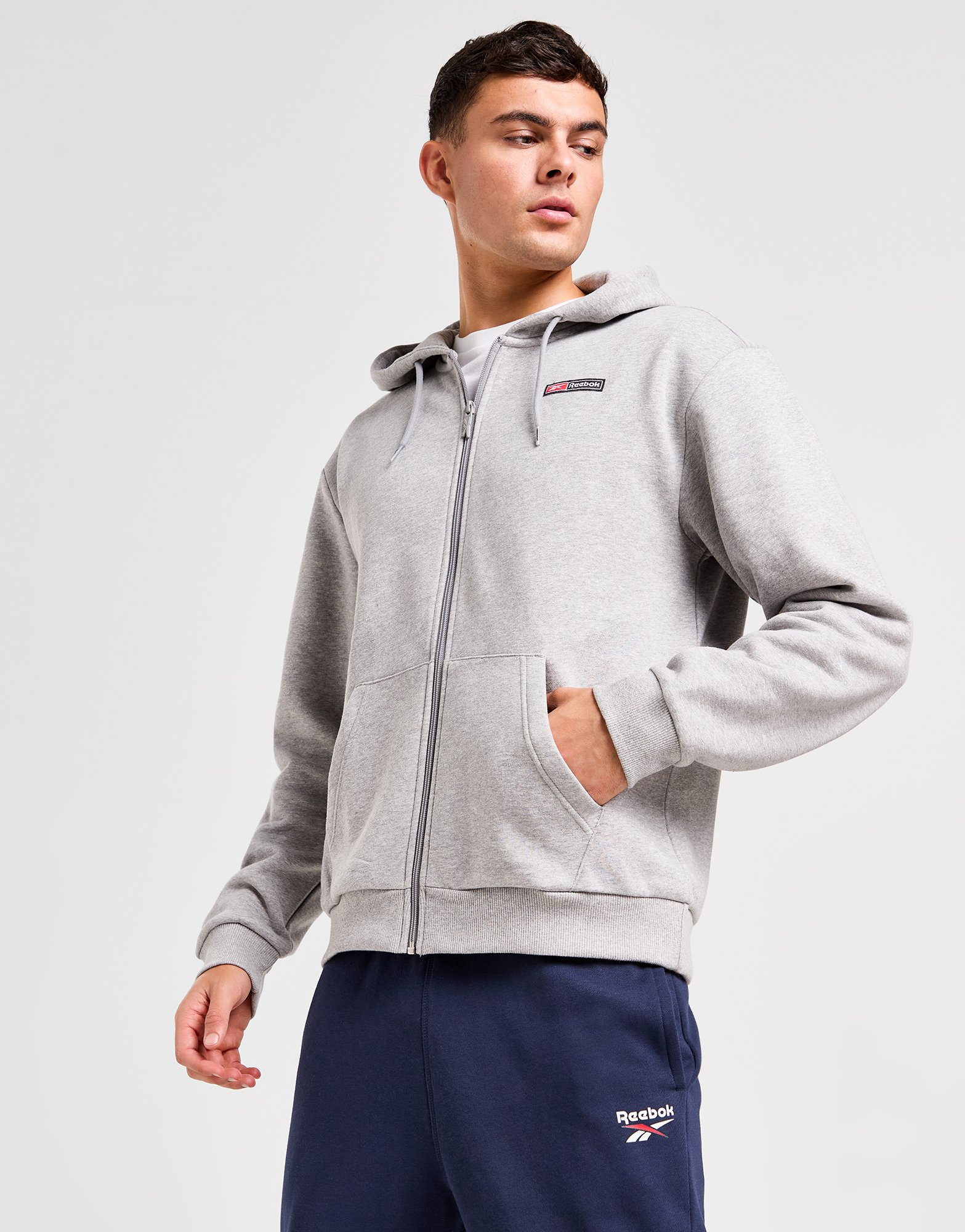 Reebok Sweat à Capuche Zippé Woven Homme