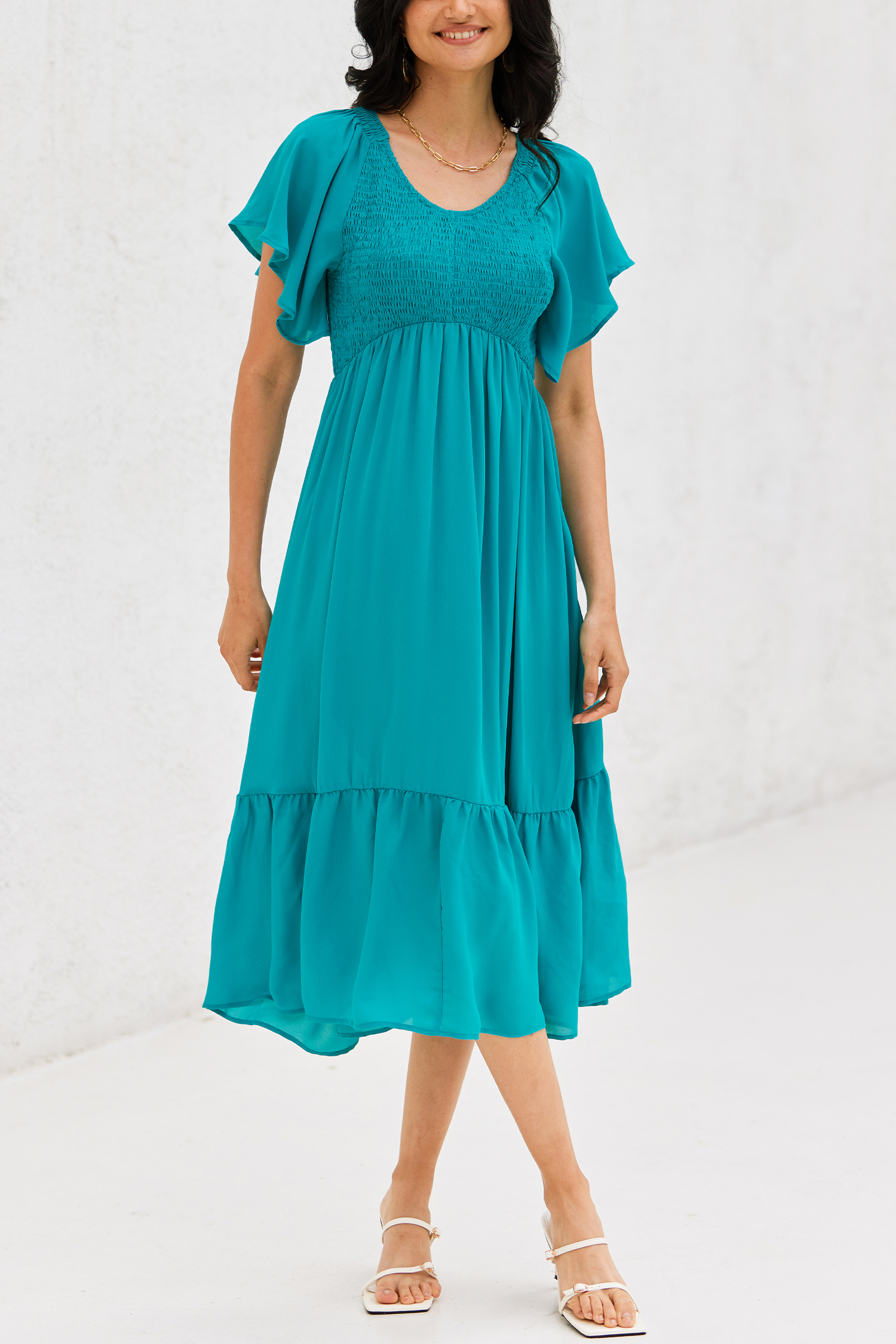Robe à volants et smocks bleue