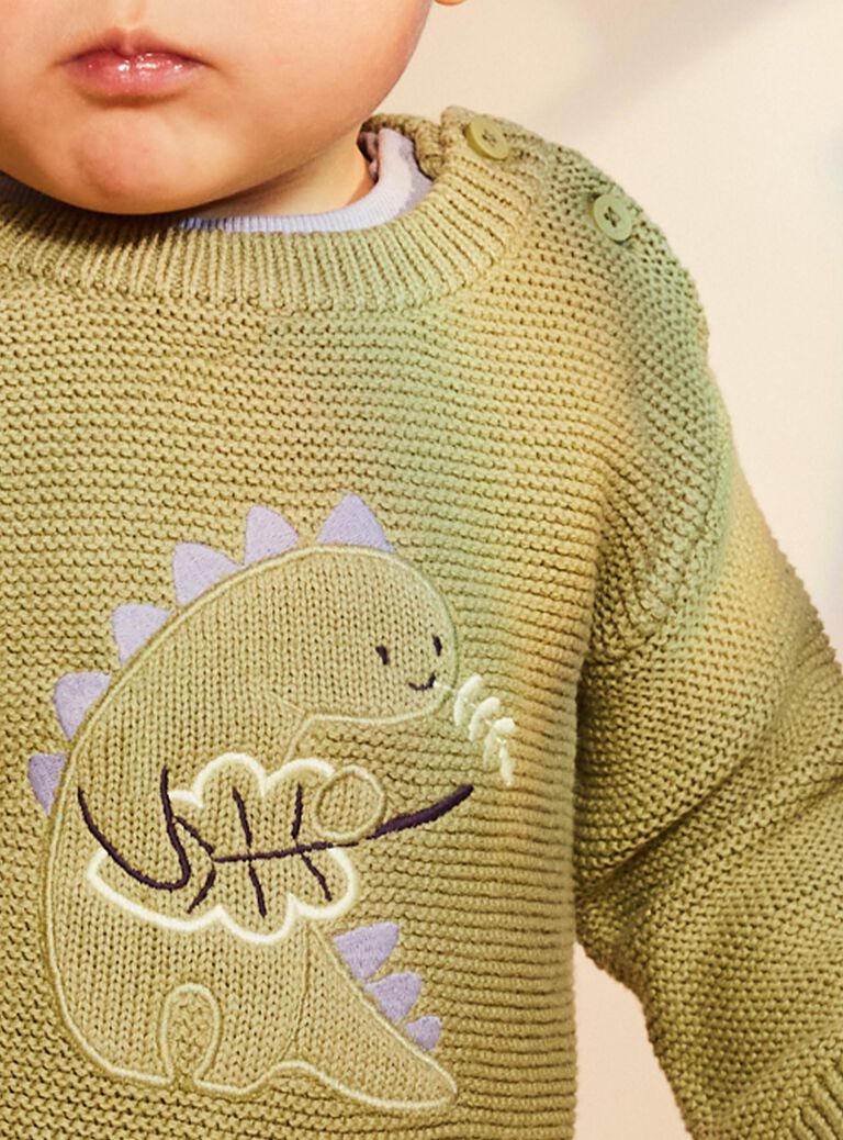 Pull kaki clair en tricot à broderie dinosaure