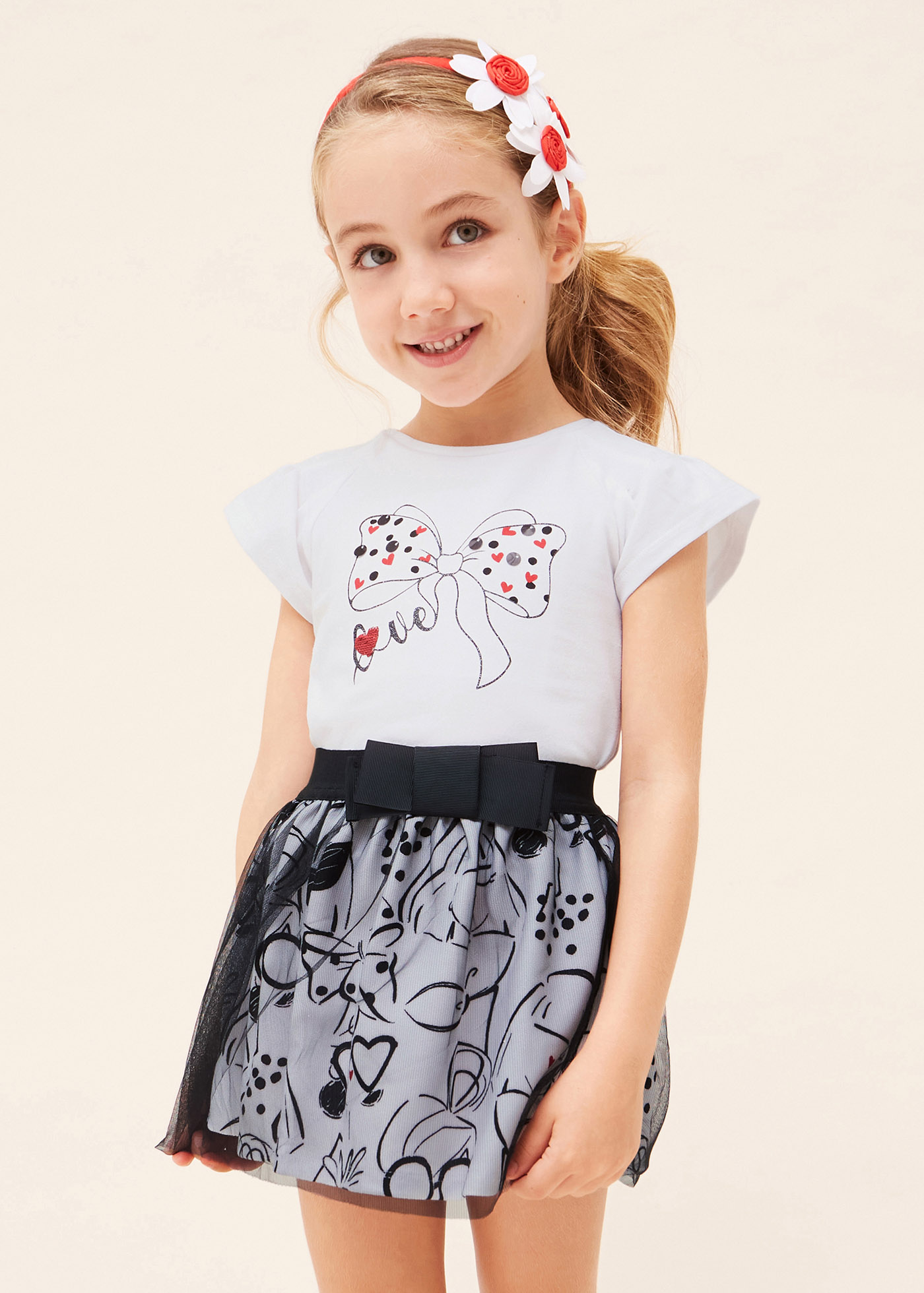 Conjunto de duas peças com saia estampada para meninas