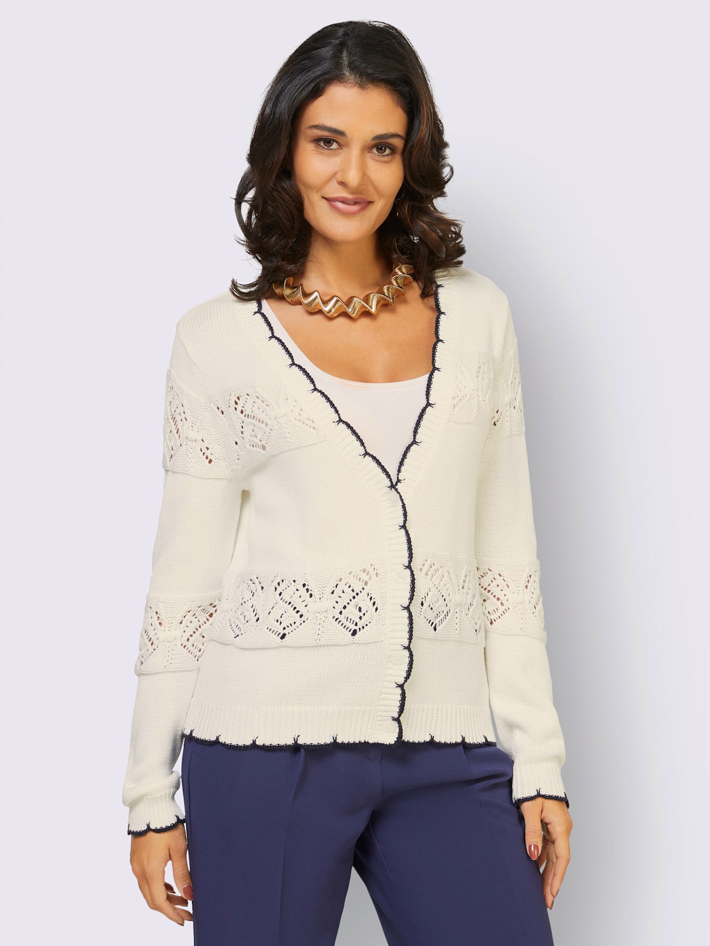 Veste en tricot avec motif ajouré