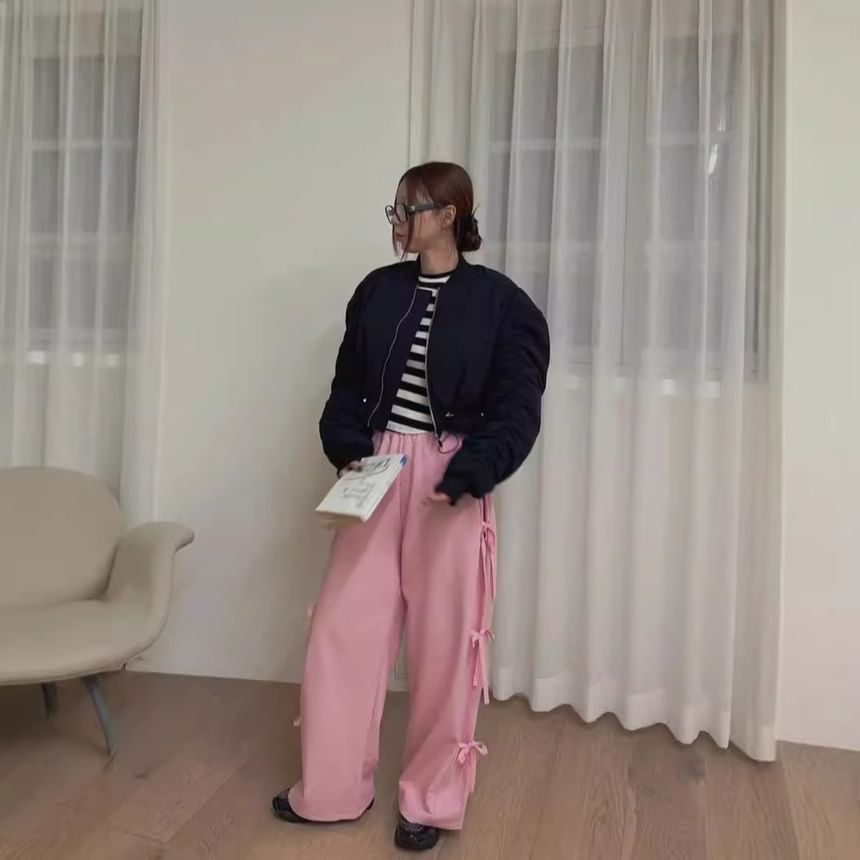 Rosesand - Wijde joggingbroek met hoge taille en strikaccent