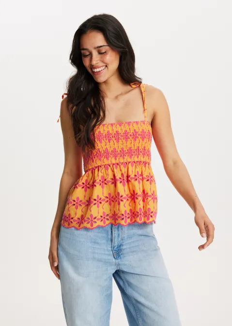 Broderie top met strikjes oranje (ORA)