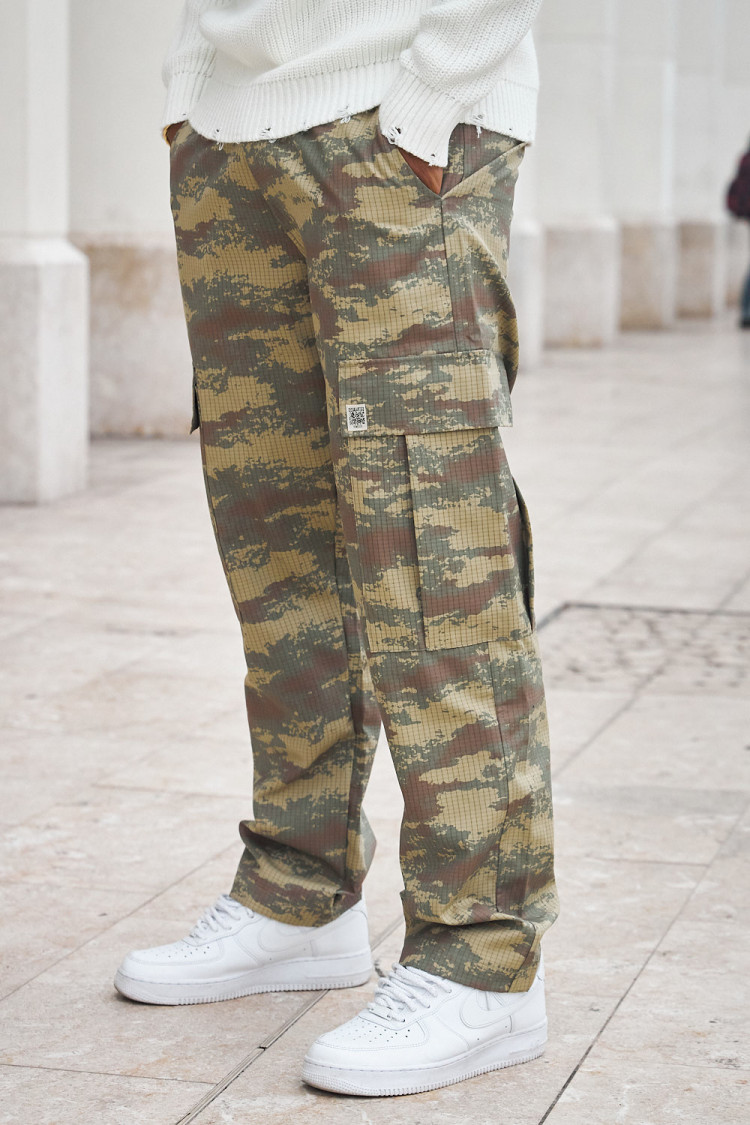 Jogging en toile camouflage vert
