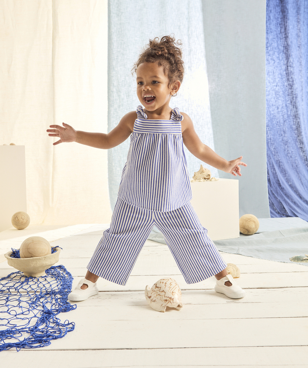 top bébé fille en fibres recycées écru et tricot côtelé à rayures bleues
