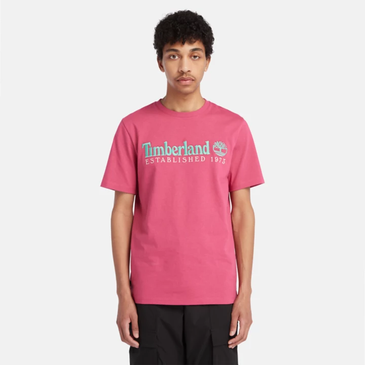 Camiseta masculina rosa da equipe Est. 1973, modelo Crew.