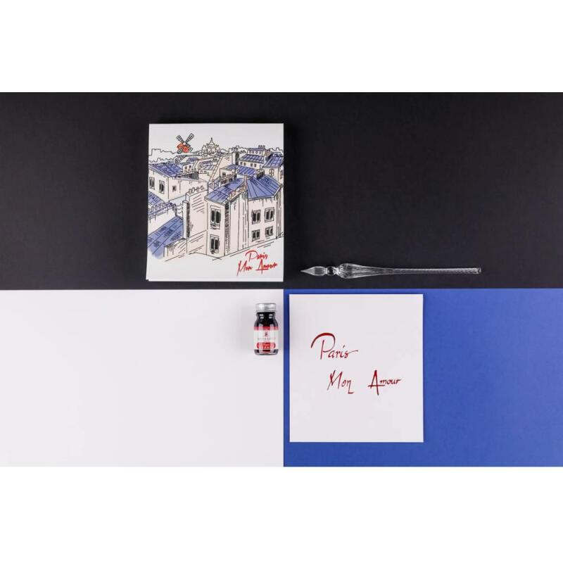 Moulin Rouge, Set de calligraphie 21x21 cm contenant une plume de verre, un flacon d'encre Moulin Rouge, un bloc de 52 feuilles