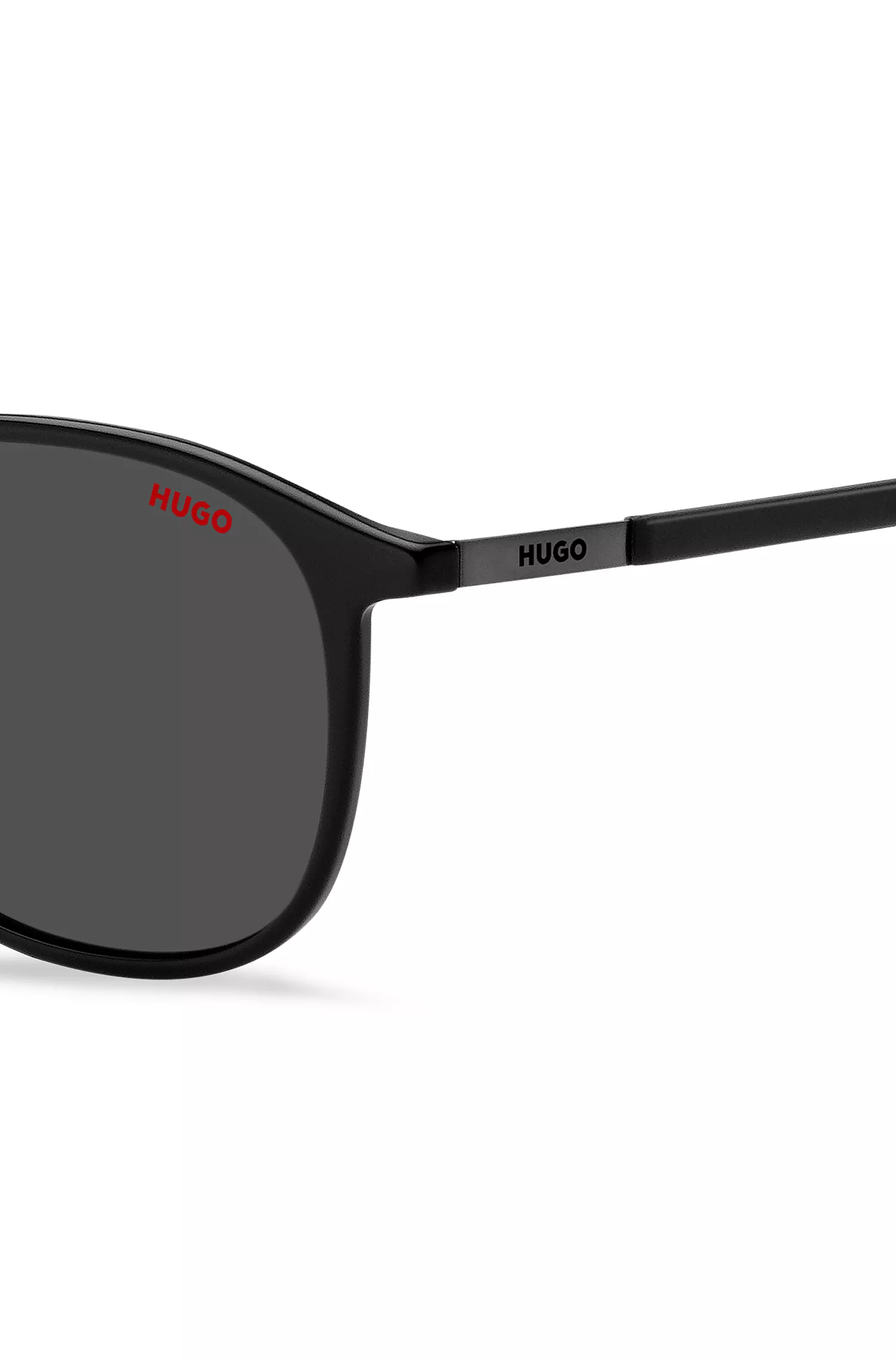 Óculos de sol HUGO vermelho e preto com hastes de aço inoxidável.