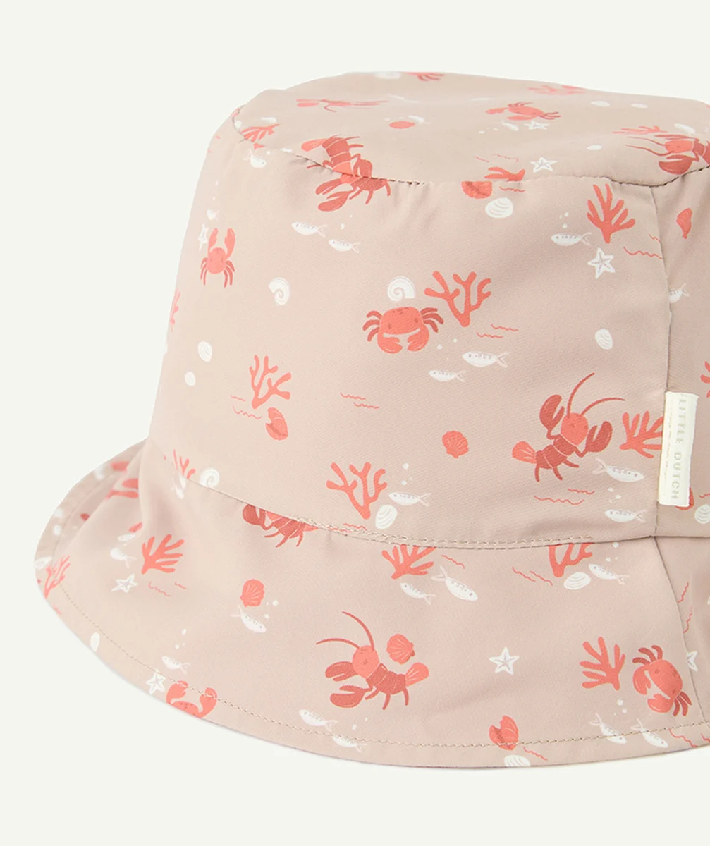 LITTLE DUTCHchapeau réversible bébé garçon orange et beige avec imprimé