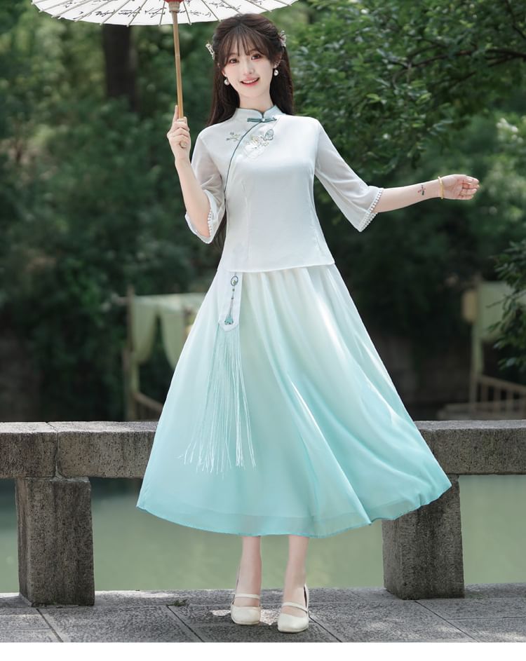 Fioridi - Hanfu-top met elleboogmouwen, geborduurde kikker en knopen / Midi-A-lijn rok met hoge taille en kwastjes