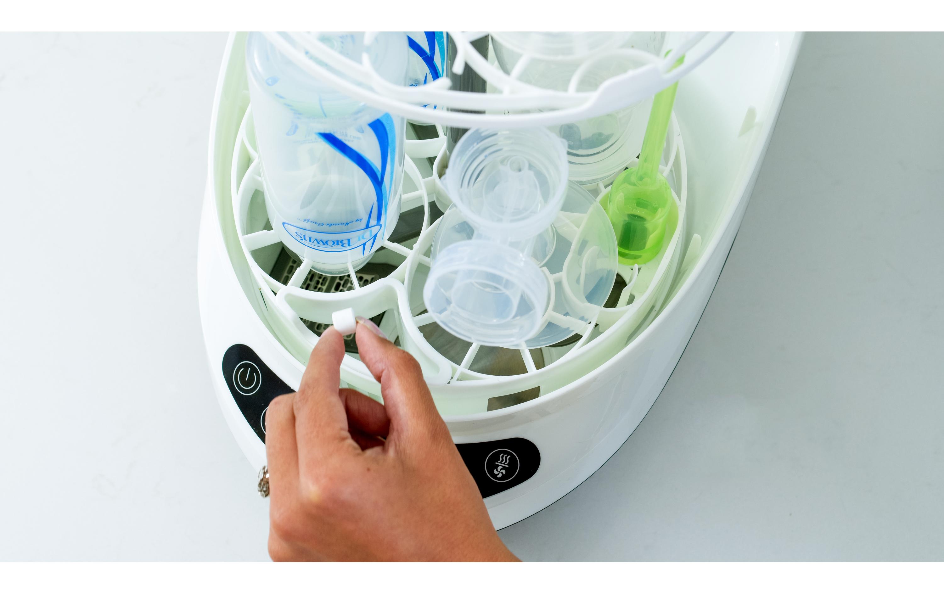 Bottle Washer Pro Weiss/Schwarz<br>Wäscht, sterilisiert und trocknet automatisch Flaschen, Pumpenteile und Trinklernbecher
