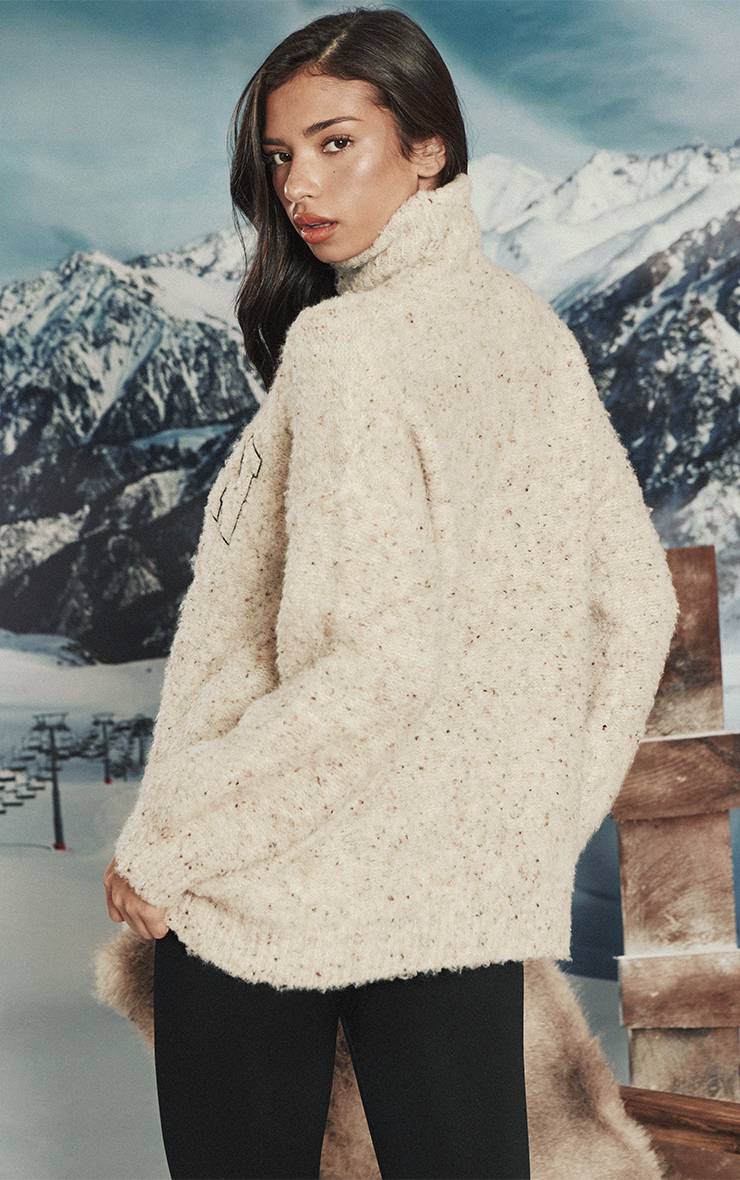 Avoine Synthétiquell En Maille Oversize Chiné Avec Slogan Brodé