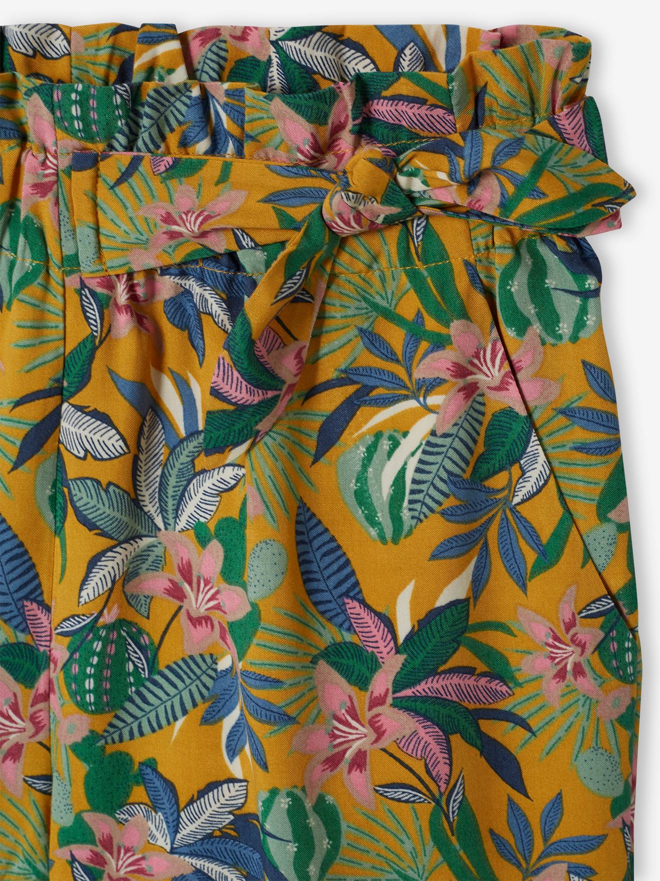 Calças com estampa floral mostarda