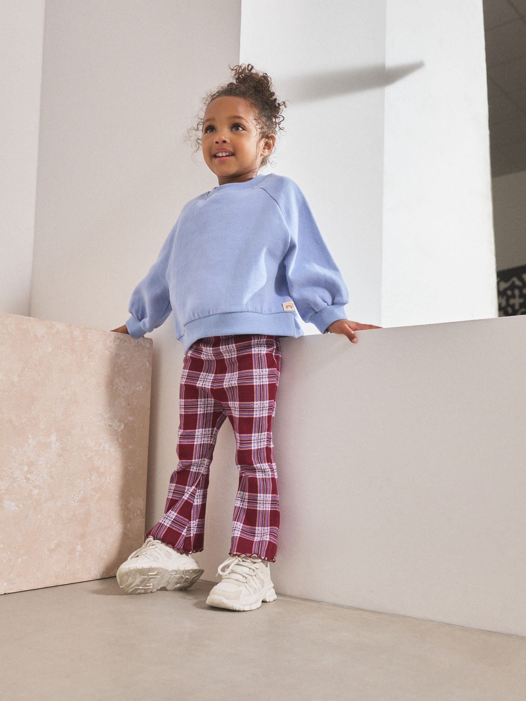 Bordeauxrood - Geribbelde flare legging (3 mnd-7 jr)