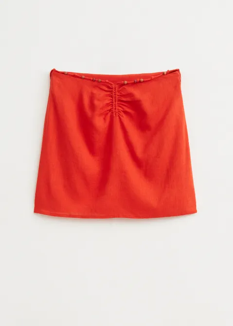 Linnen mini rok met kraaltjes oranje (ORA.D)